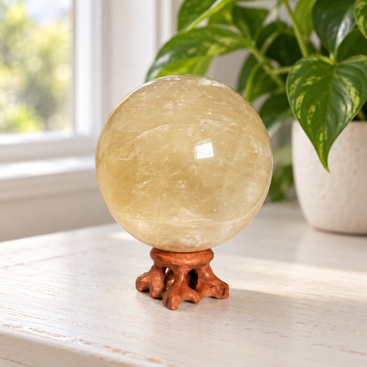 Large Honey Calcite Sphere — Polished Golden Crystal Ball, Translucent Amber Glow with Rainbow Flashes, 3.6 Inches, Wood Stand