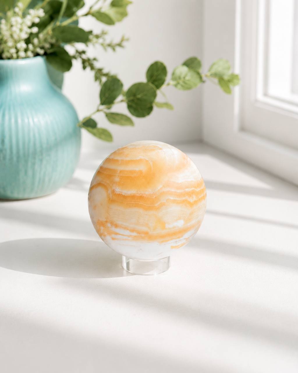 Honey calcite sphere lifestyle photo