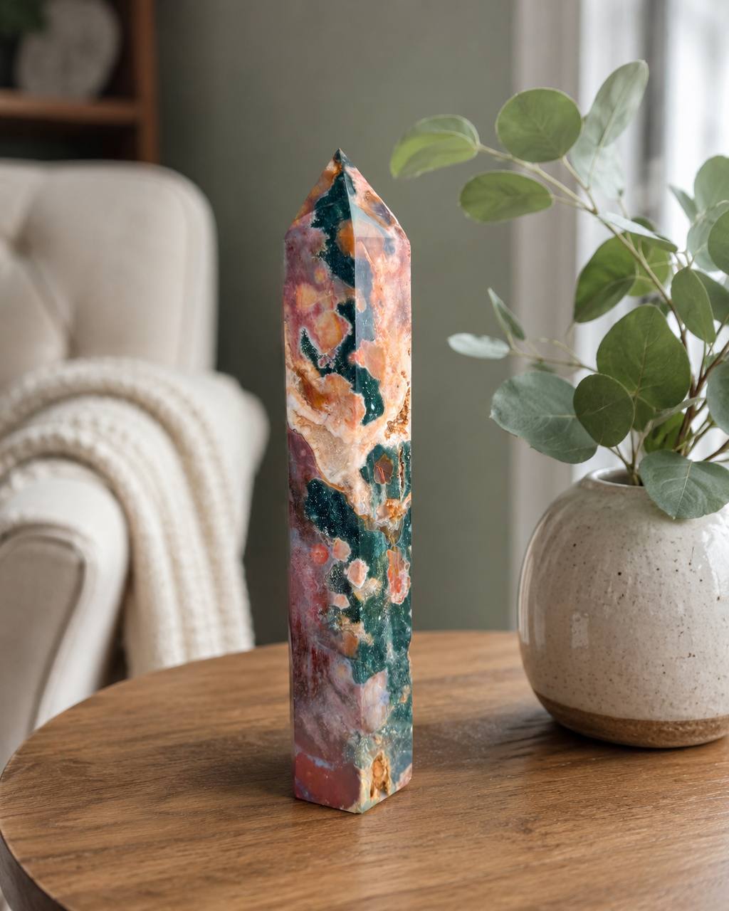 Large ocean jasper tower on wooden table