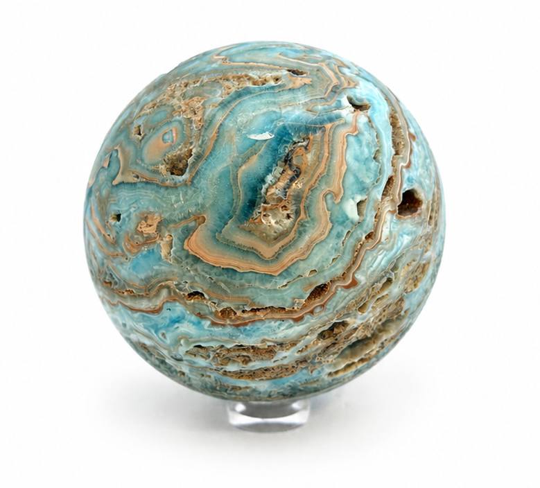 Caribbean calcite sphere showing vivid blue and tan banding
