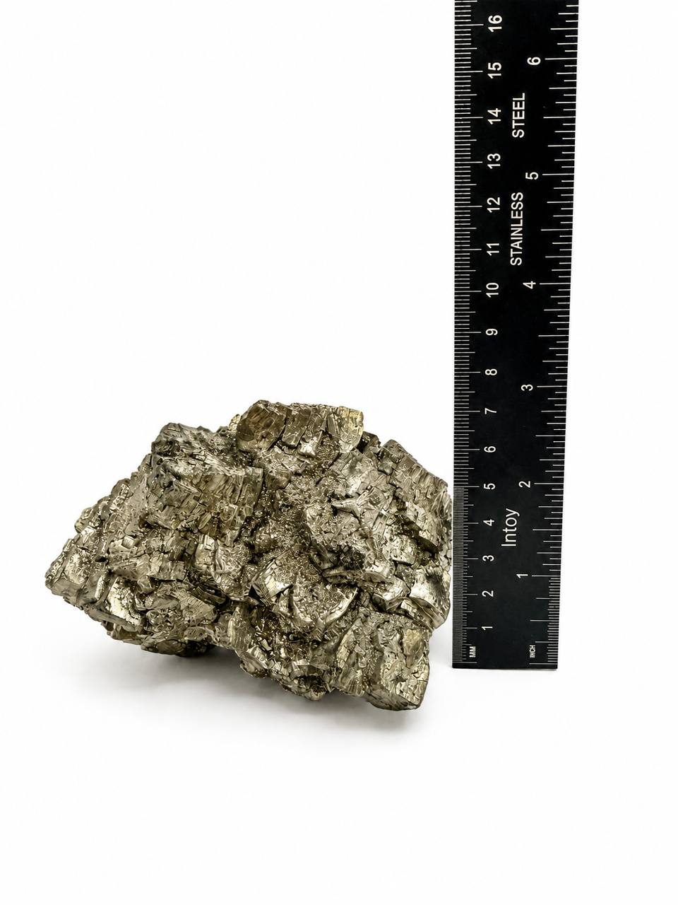 Pyrite cluster height measurement showing approximately 3.5 inches tall