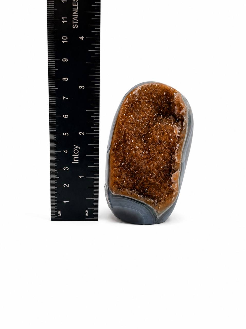 Citrine agate freeform with ruler showing 4 inches tall