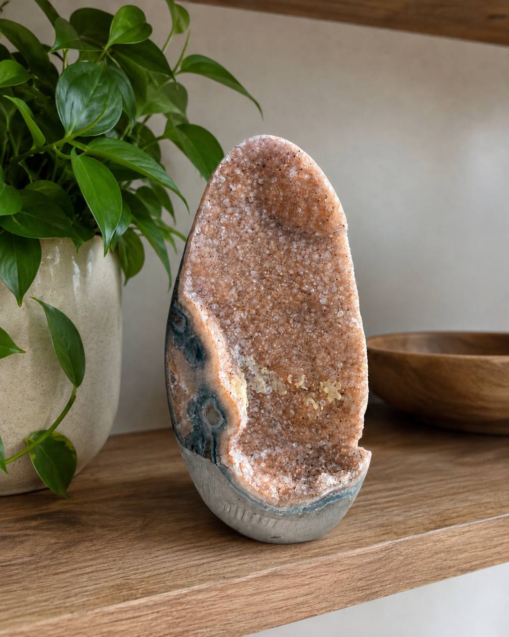 Pink Amethyst Geode Freeform lifestyle display on wooden shelf