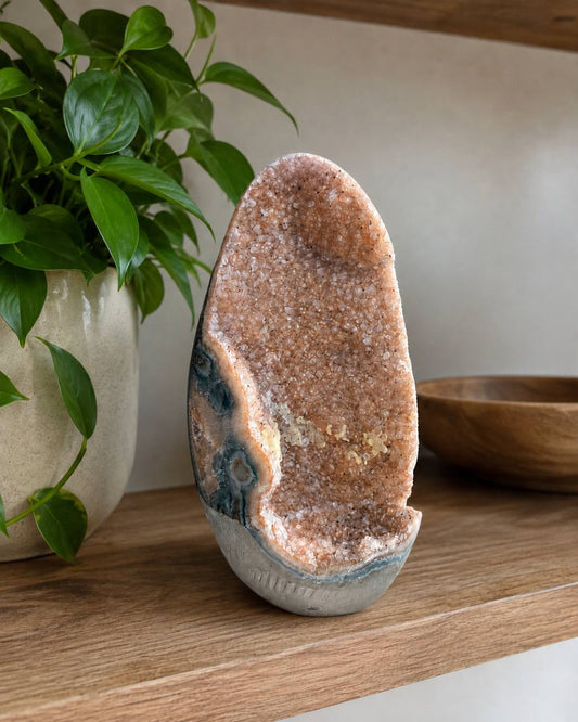 Pink Amethyst Geode Freeform lifestyle display on wooden shelf