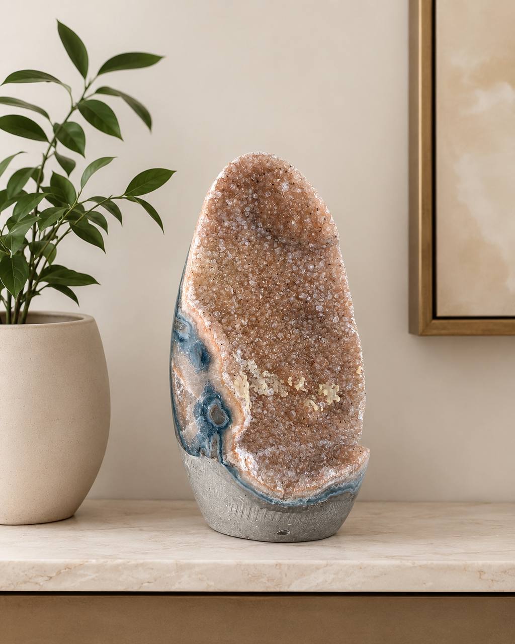 Pink Amethyst Geode Freeform styled on marble surface