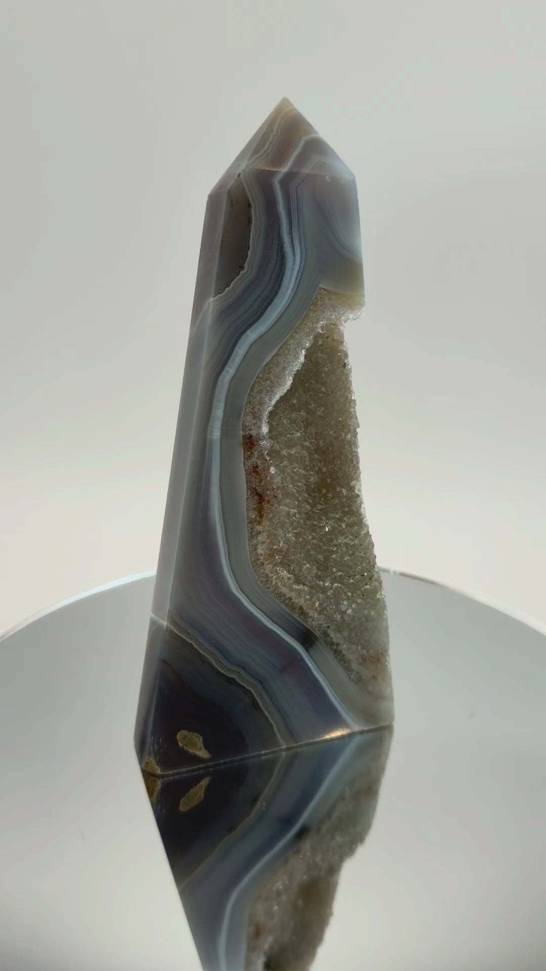 Blue banded agate obelisk with druzy quartz pocket