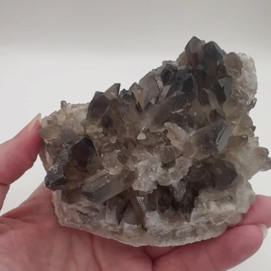 Smoky quartz crystal cluster video