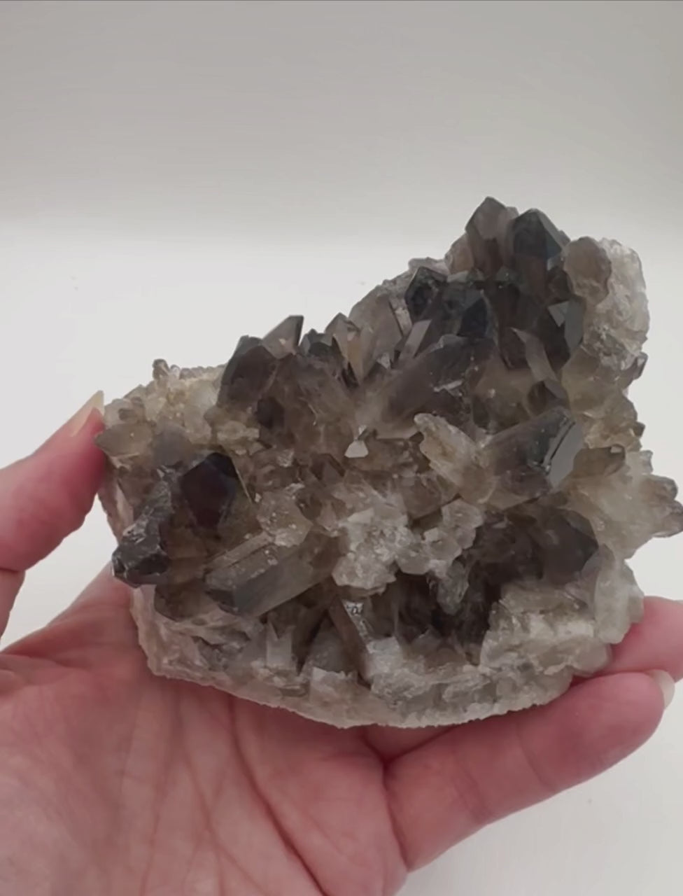 Smoky quartz crystal cluster video
