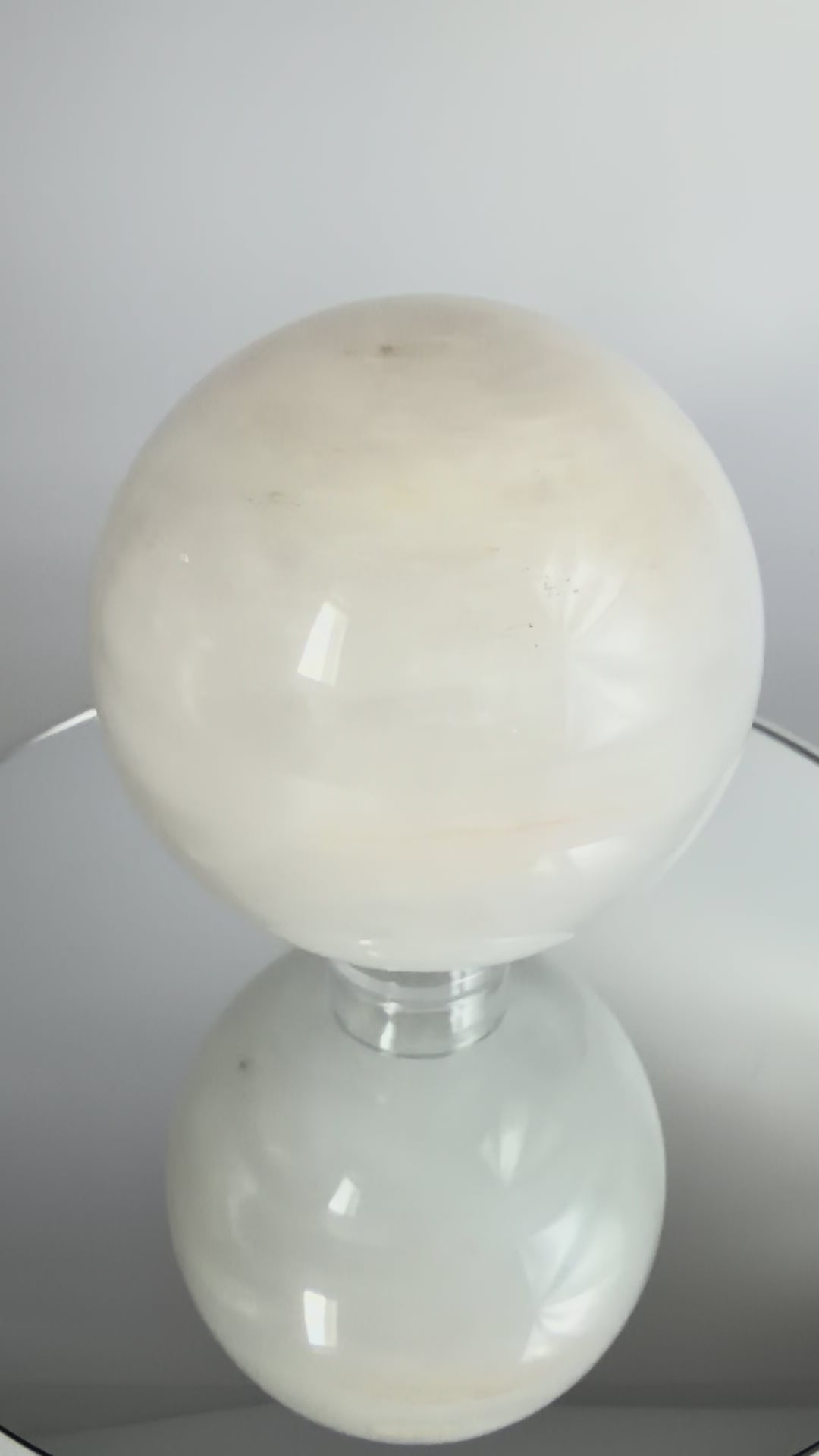 Milky quartz sphere, turning