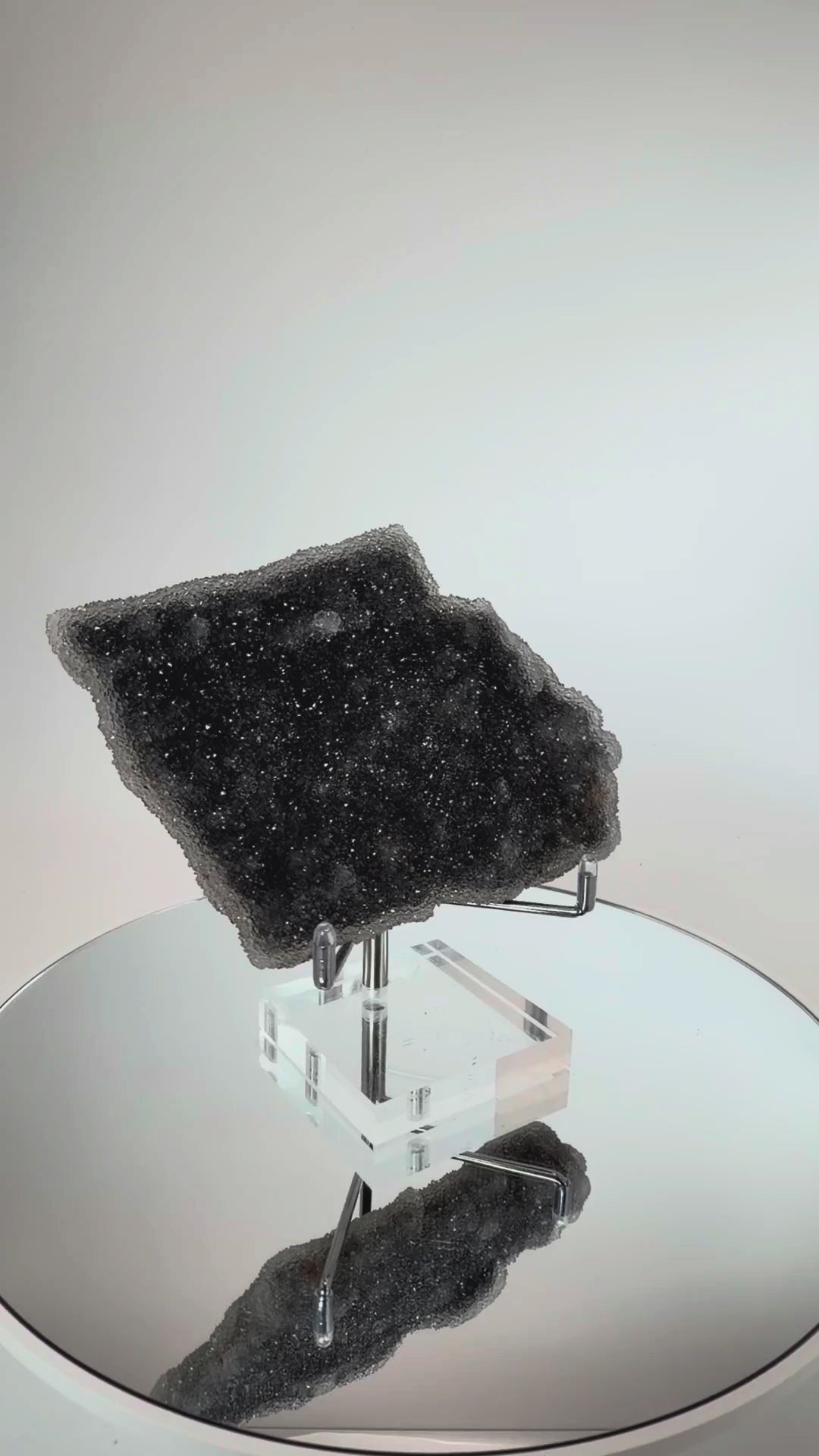 Amethyst druzy plate turning in the light