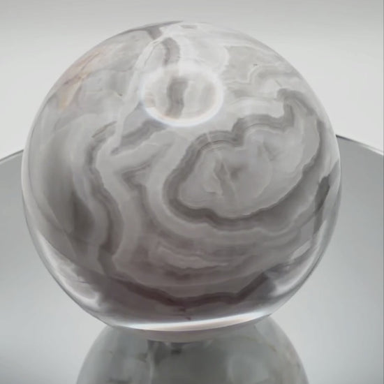 Grey banded onyx sphere video