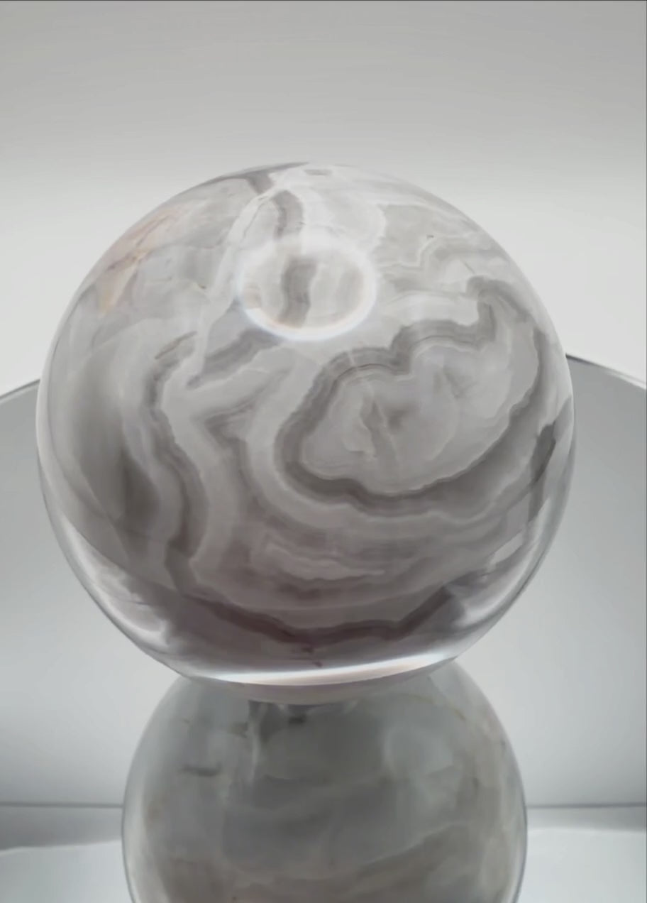 Grey banded onyx sphere video