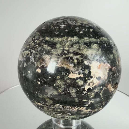 Ocean jasper sphere, turning