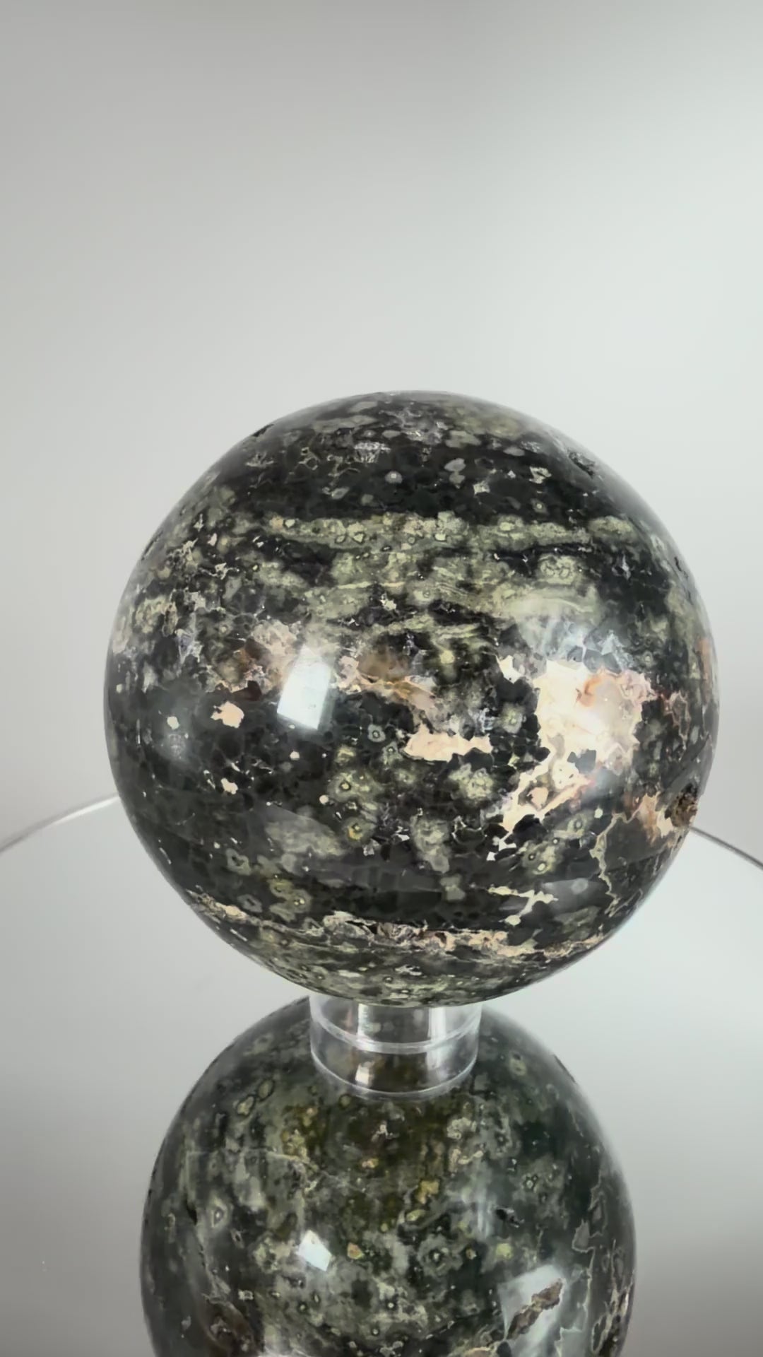 Ocean jasper sphere, turning