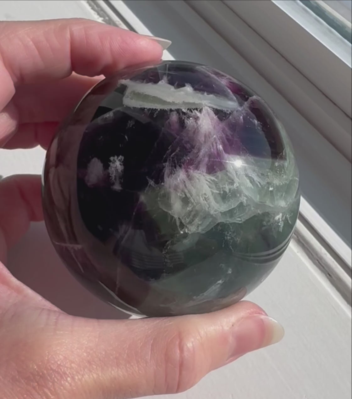 Rainbow fluorite sphere video