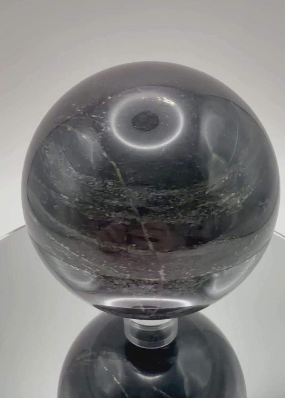 Silver Sheen Obsidian sphere video showing silvery flash and polish