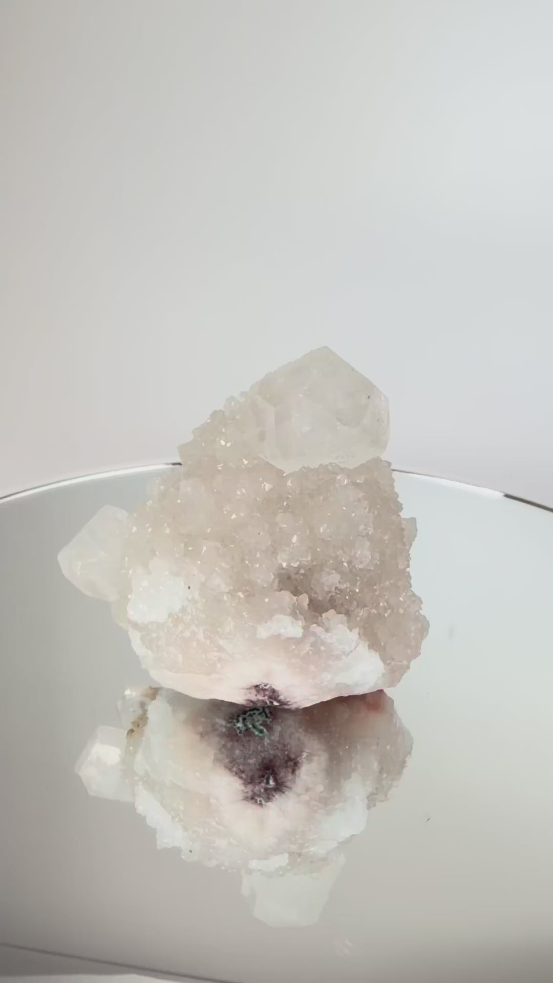 White apophyllite cluster with clear terminated crystal