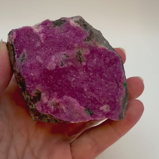 Pink cobaltoan calcite druzy specimen video showing sparkle and color from multiple angles
