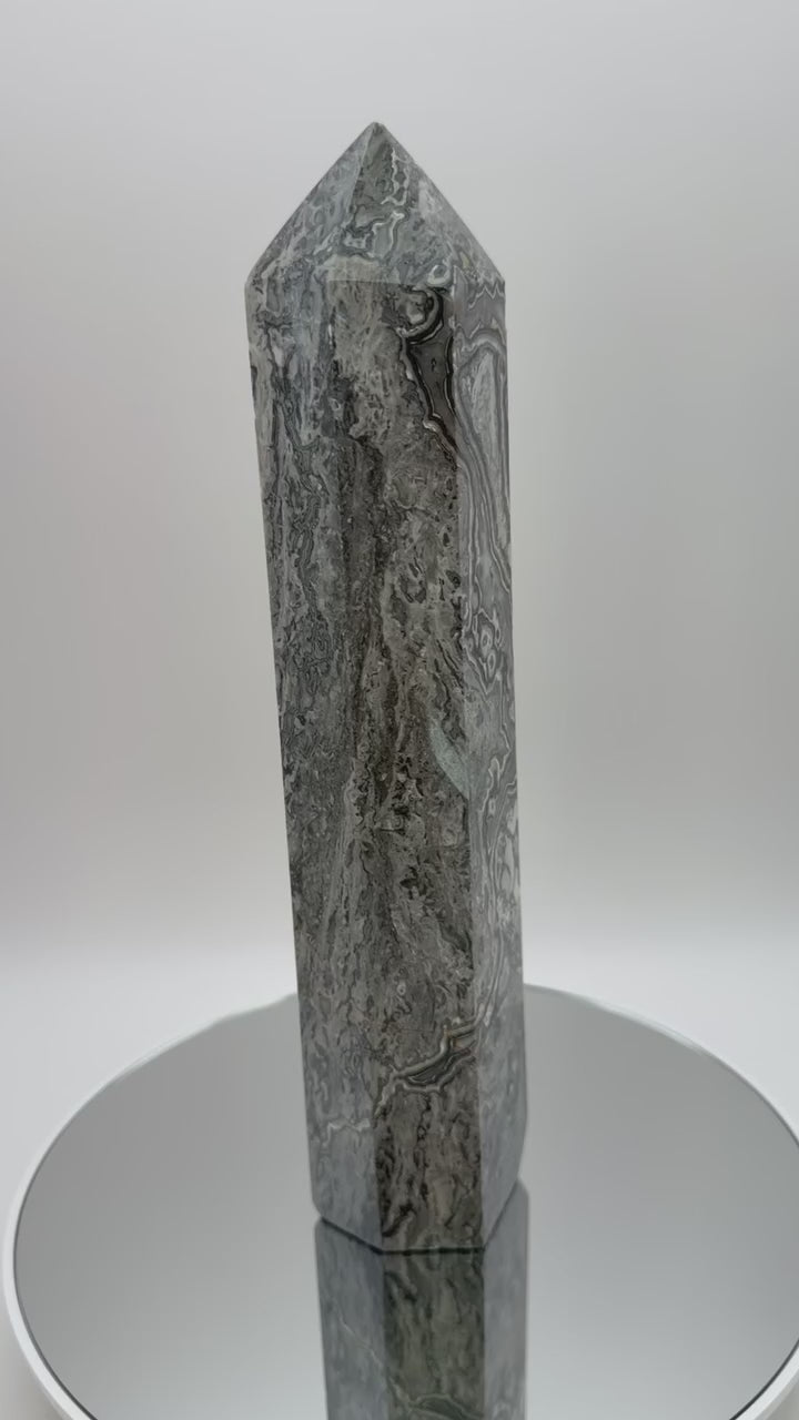 Picasso Jasper tower video showing swirling grey and black patterns