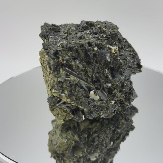 Epidote specimen turning in the light