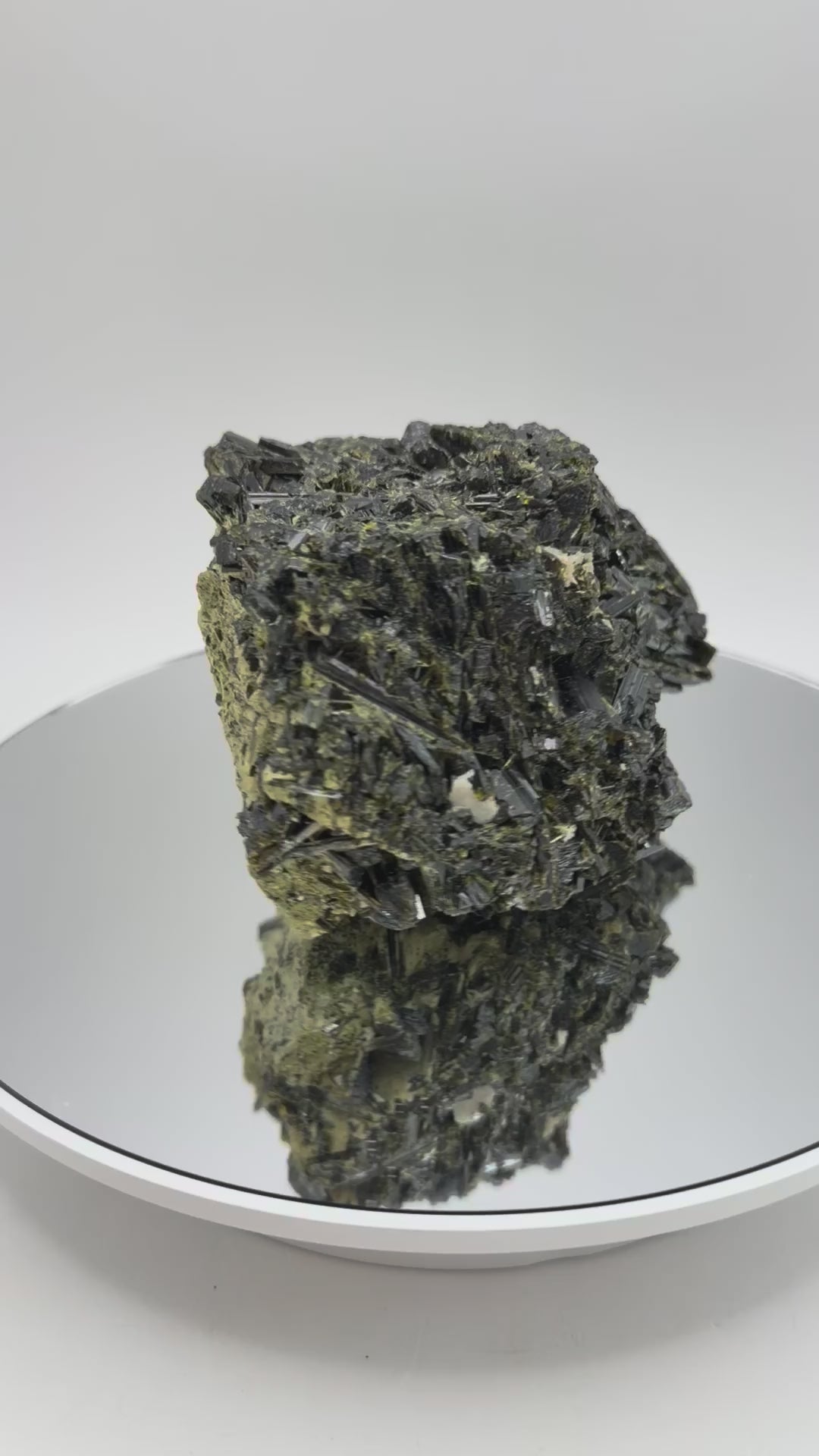 Epidote specimen turning in the light