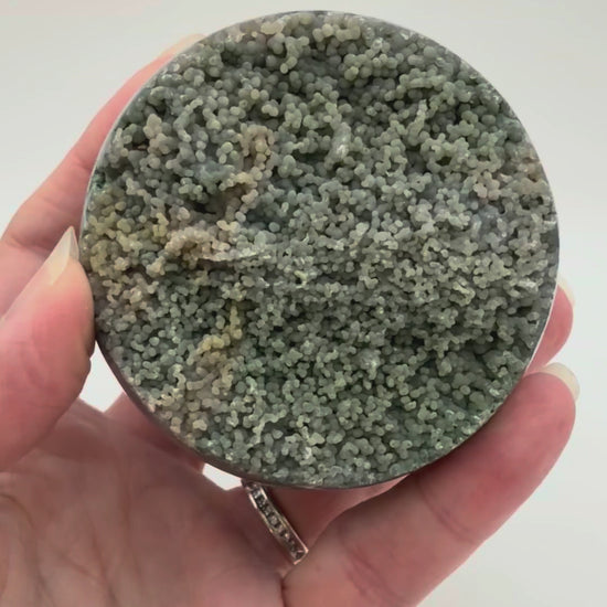 Ocean jasper sphere with raw druzy pocket, green orbicular crystal ball