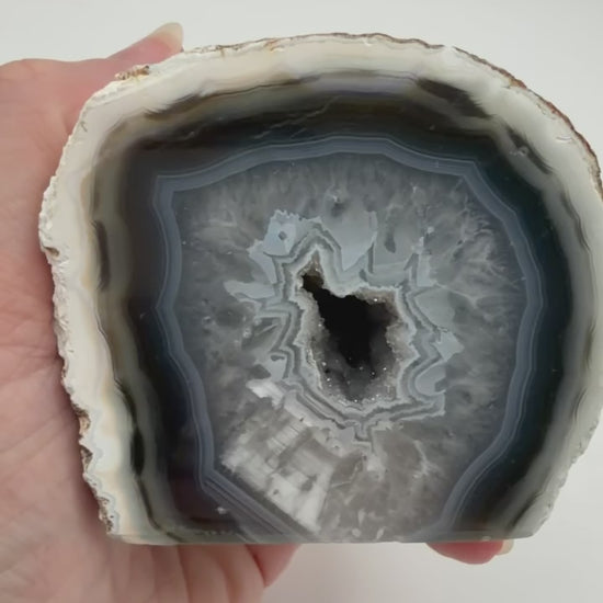 Brazilian agate geode half video showing banding and druzy detail