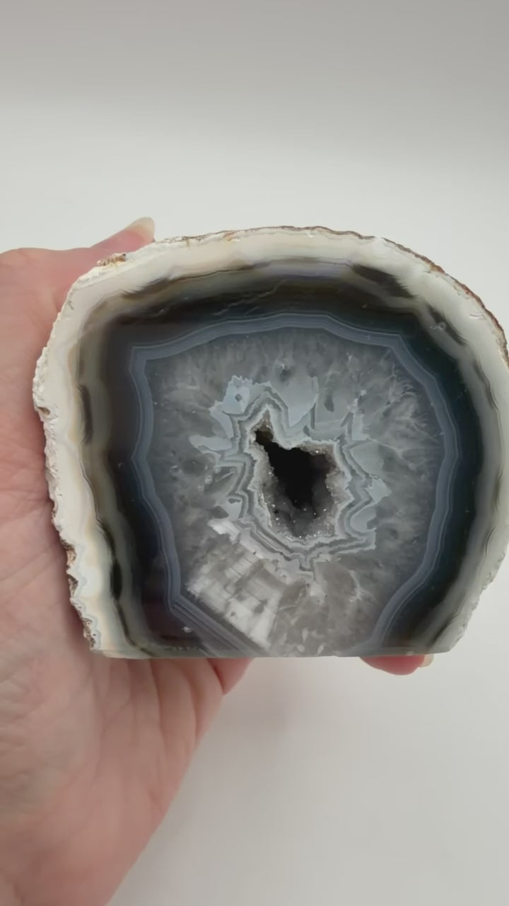 Brazilian agate geode half video showing banding and druzy detail