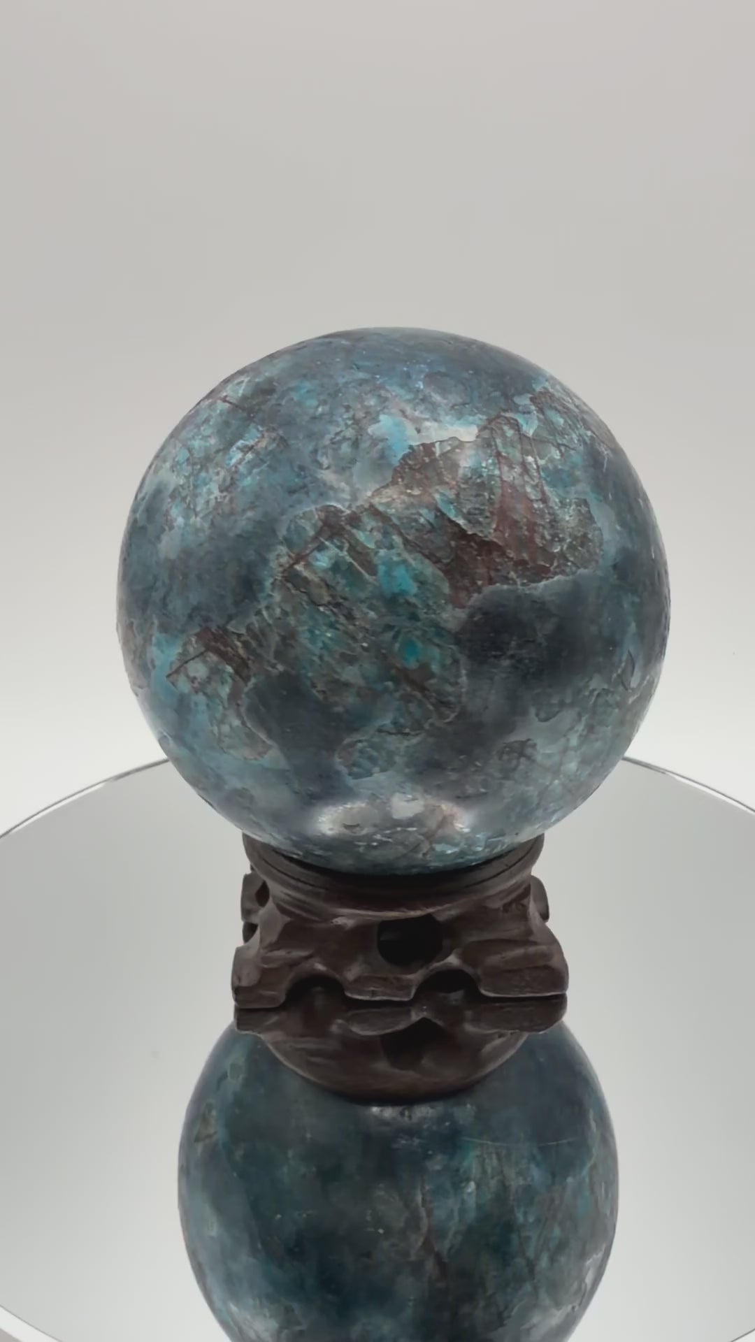 Blue apatite sphere, turning