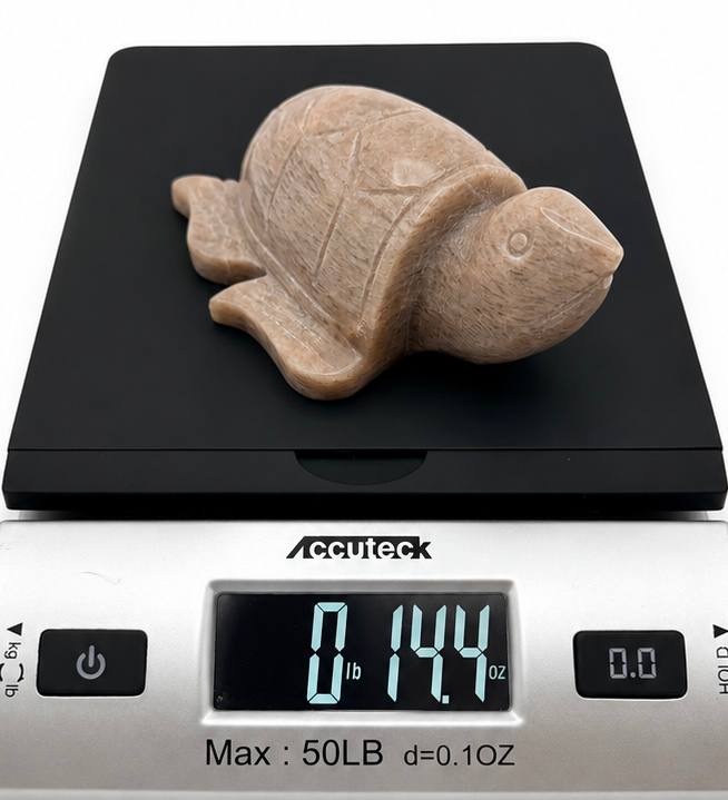 Peach moonstone turtle front view