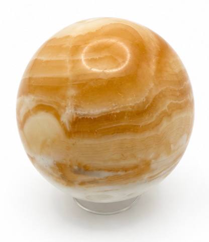 Honey calcite sphere with warm amber and cream banding