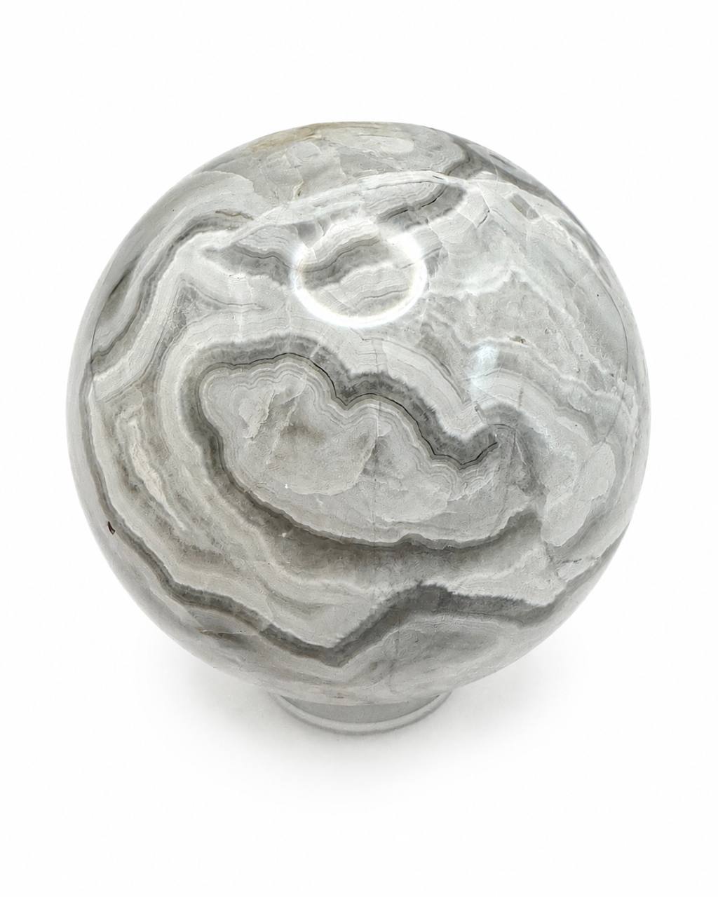Grey banded onyx sphere with concentric grey and white banding