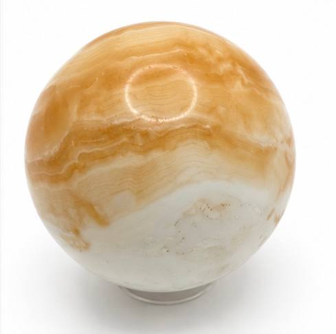 Honey calcite sphere side view